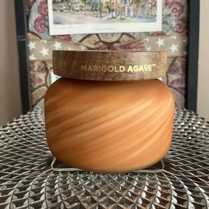 new with sticker Anthropology Capri Blue candles.